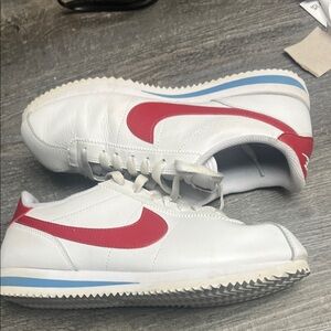 Nike woman’s   White and Red Sneakers with Blue Accents